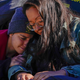 Youth Climate Activists Abby Leedy and Julie Paramo, who are both on a hunger strike, embrace at an action on October 27, 2021 in Washington, DC.